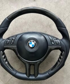 "BMW E46 carbon steering wheel featuring lightweight carbon fiber construction, ergonomic grips, and premium style for 3 Series interiors."