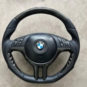 "BMW E46 carbon steering wheel featuring lightweight carbon fiber construction, ergonomic grips, and premium style for 3 Series interiors."