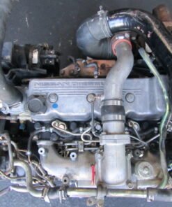"Nissan FD46 4.6 Turbo Diesel engine, inline-six heavy-duty engine with turbocharging for commercial trucks, reliable, durable, and high torque."