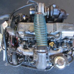 "TOYOTA 14B 3.7 Turbo Diesel engine showing robust cast iron block, turbocharger, and durable components."